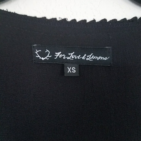 FOR LOVE & LEMONS Surplice Front Long Sleeve Top In Black XS. - Picture 5 of 6